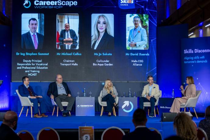 Panel of speakers on stage